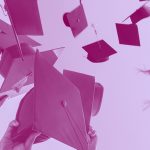 graduation caps thrown into the air, purple filter.