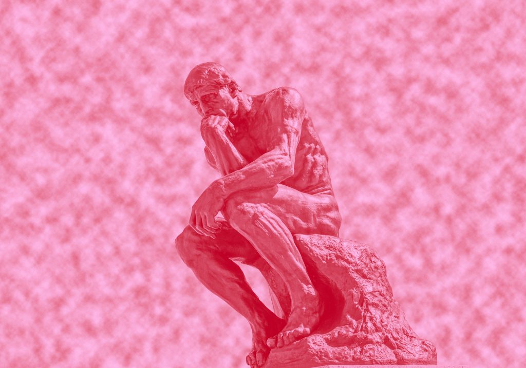 Photo of Rodin's The Thinker statue, pink filter