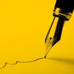 fountain pen drawing a line, yellow filter.
