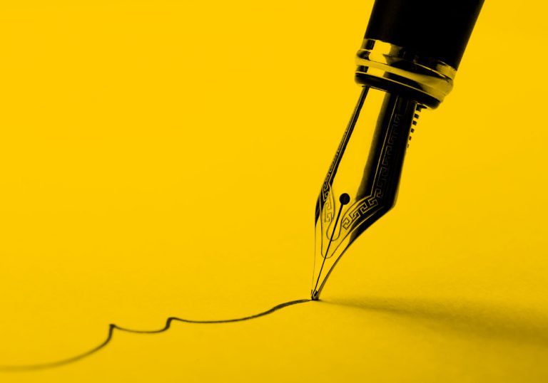 fountain pen drawing a line, yellow filter.