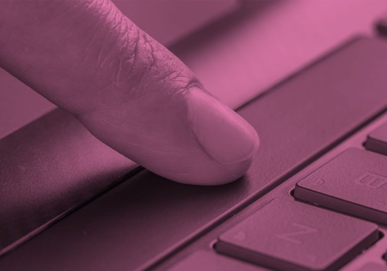 finger pushing space bar button on a keyboard, pink filter