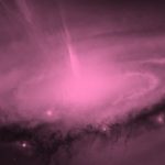 pink filtered image of galaxy core in space