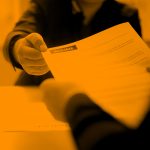 Image of someone handing over their resume, in an orange filter.