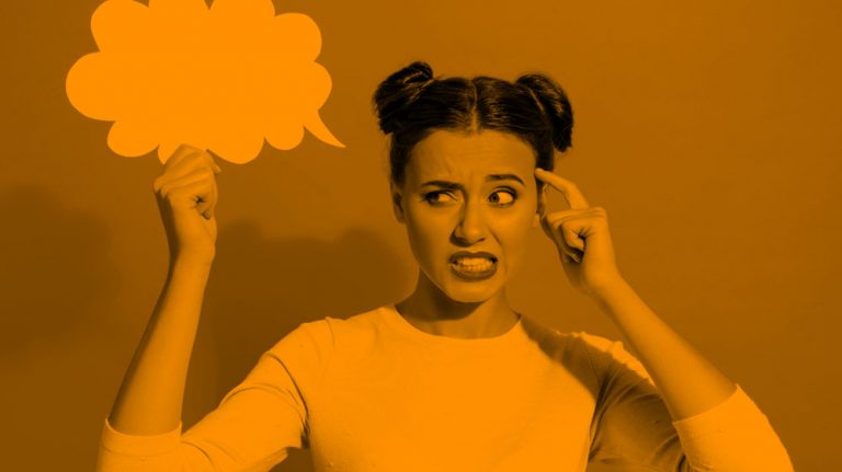 young woman holding up a thinking bubble and looking confused, orange fulter.