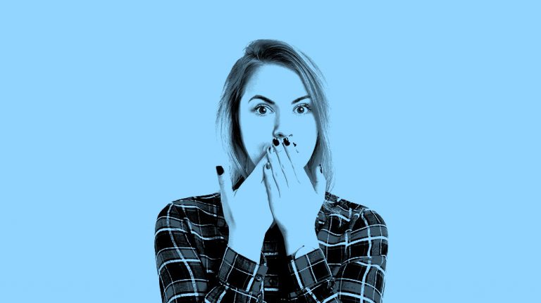 image of woman covering up her mouth with her hands, in a light blue filter.