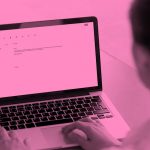 image of woman writing an email, in a pink filter.
