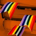 book with rainbow bookmark
