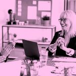 group of people talking at work