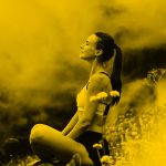 woman meditating in field