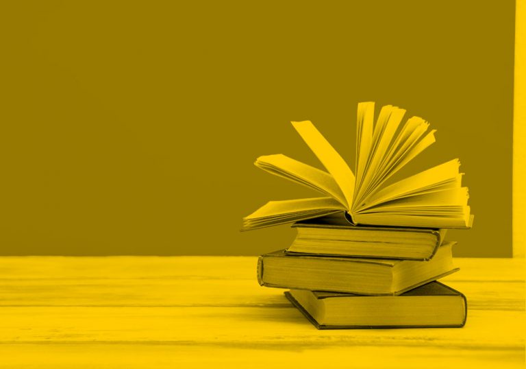pile of books, yellow filter