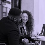 couple on date talking, purple filter