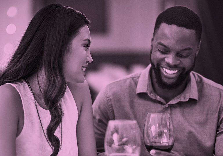 couple on a date; pink filter